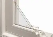 Open white window with safety restrictor.