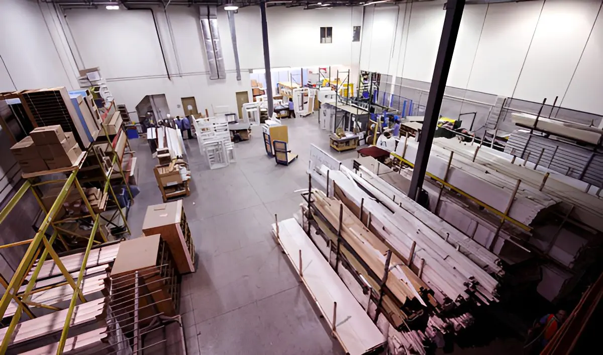 Large industrial warehouse with stacked materials.