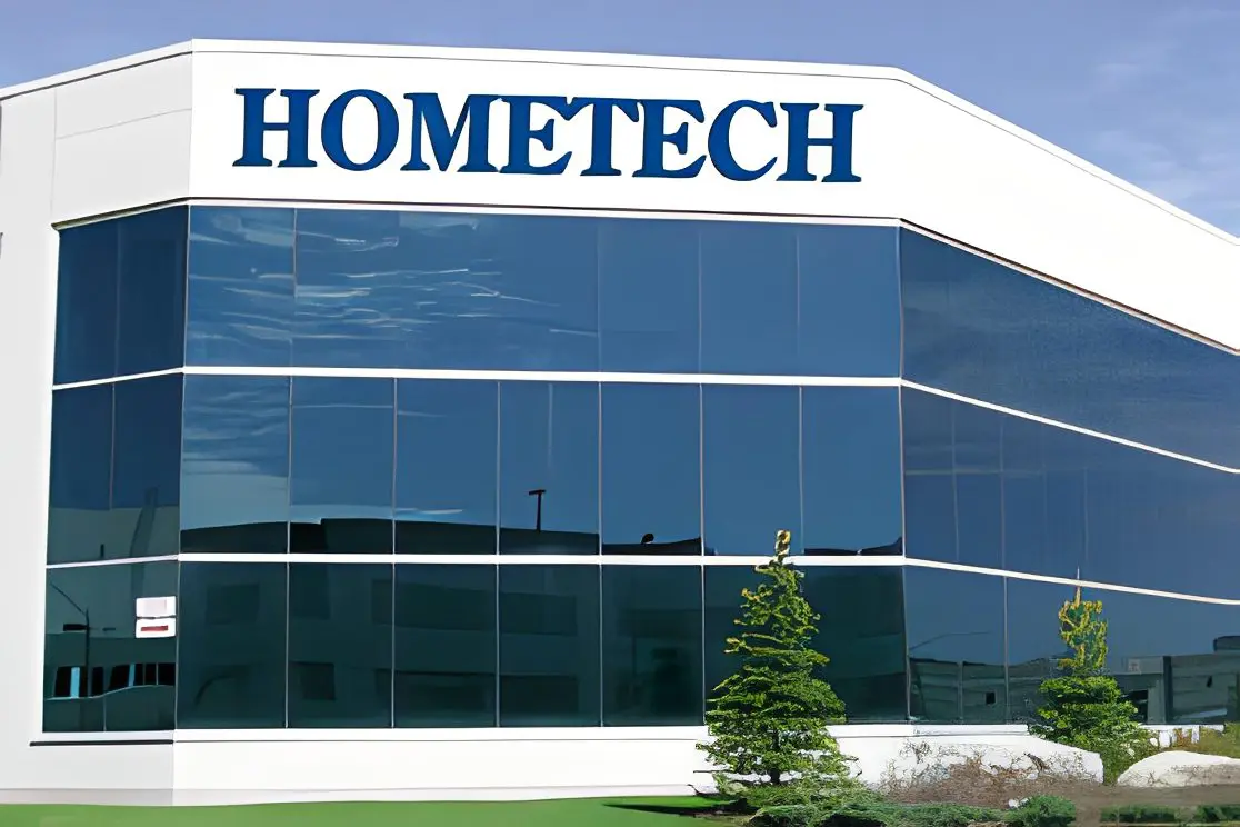 Glass building with "HOMETECH" sign on top.